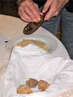 white truffle shaved over risotto at La Sosta in Montebone